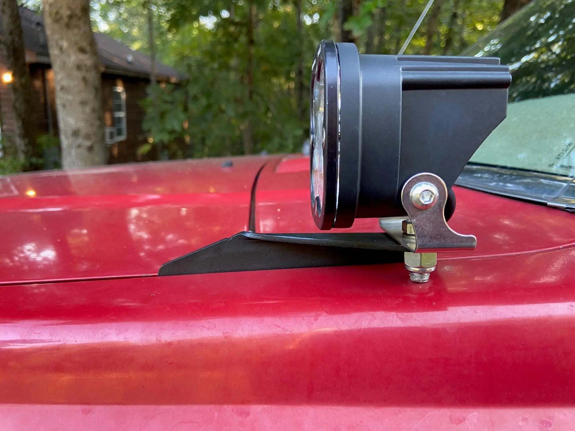 1985-1988 Toyota Hilux hood ditch light mounts installed on truck hood with LED light pods