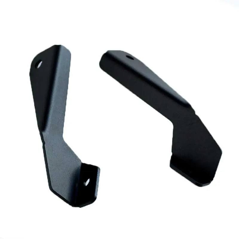 1990-1995 Toyota 4Runner hood ditch light mounts installed, showing black steel bracket on vehicle hood edge