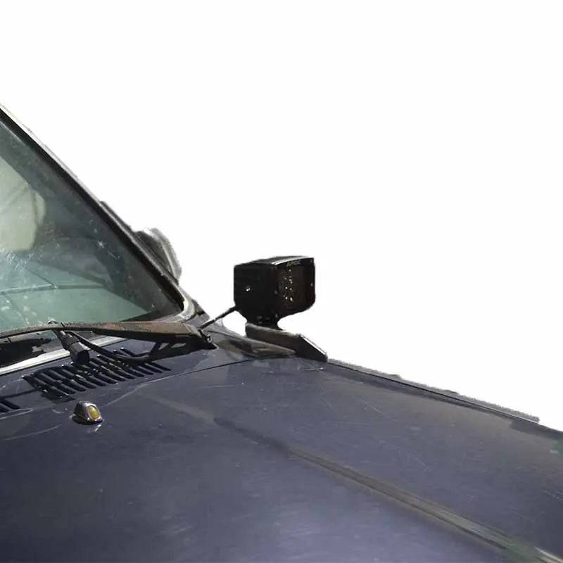 1990-1995 Toyota 4Runner hood ditch light mounts installed on vehicle hood hinges
