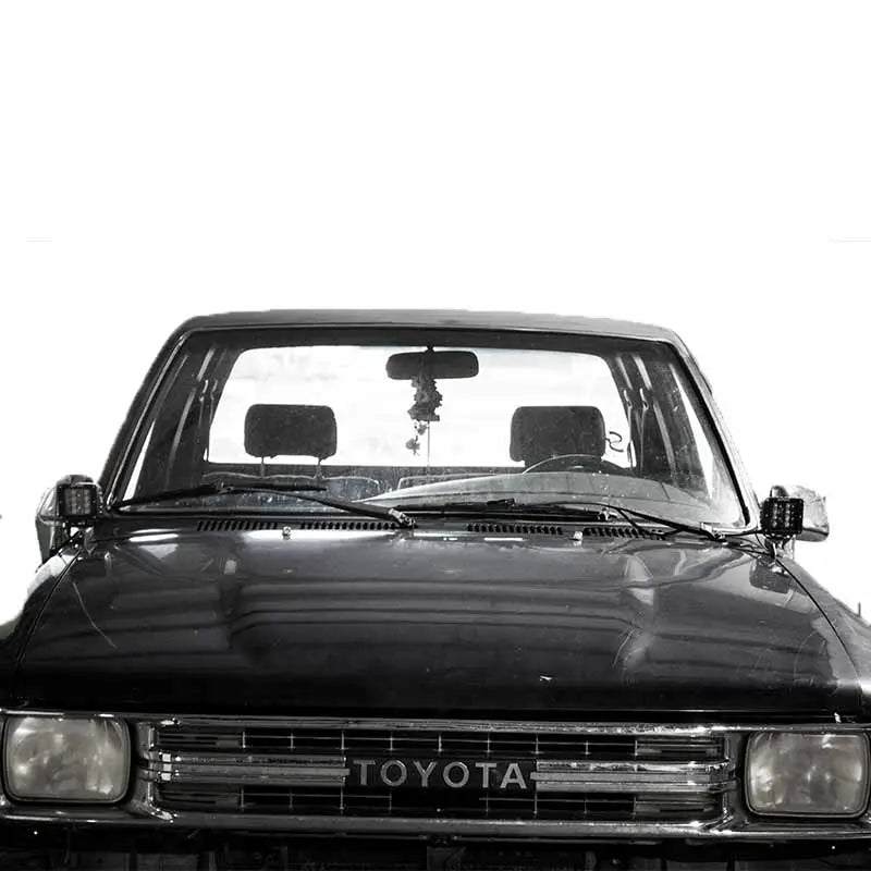 Toyota 4Runner hood ditch light mounts for 1990-1995 models, bolt-on installation, black powder-coated steel brackets