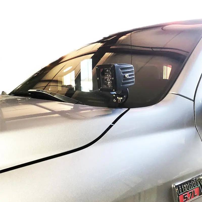 2007-2013 Toyota Tundra with black bolt-on hood ditch light mounts installed